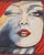 With one eye closed and the other open, the playful and sultry self portrait of Helene Guetary is strikingly different...