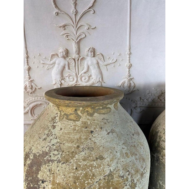 Spanish Pair of Monumental Terracotta Olive Jars With Weathered Patina For Sale - Image 3 of 17