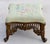 Add a touch of timeless European elegance to your home with this exquisite circa 1940s Rococo Revival footstool....