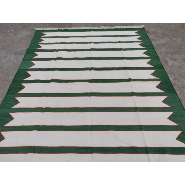 Handmade Green and Red Geometric Border and Cream Fringe Cotton Rug For Sale - Image 6 of 11