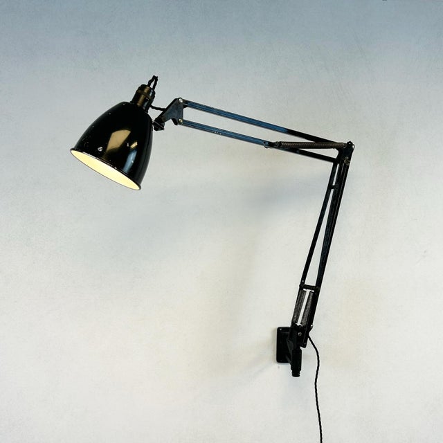 Wall-mounted herbert terry 1209 anglepoise with twin coil spring counterbalance mechanism. British-made task light...
