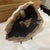 A wonderful slice of hand polished petrified wood with live edge will add an organic touch to just about any space in your...