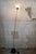 Floor lamp with cast iron base, chromed metal stem, and Murano glass diffuser. Farfallone model Designer Toni Zuccheri...