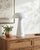Illuminate your space with the chic and portable Umbra accent table lamp, a beacon of minimalist modern style. Standing at...