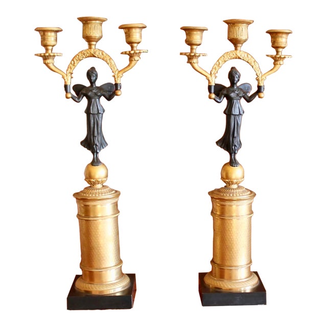 Pair of Continental Gilt Figural Neoclassical Candelabra For Sale
