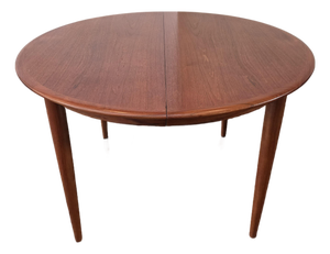 Mid- Century Danish Modern Teak Dining Table Round Opens Oval 105 Inches With 3 Leaves