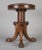 Regency mahogany adjustable revolving piano stool on tripod base with spiral carved pedestal terminating in carved finial,...