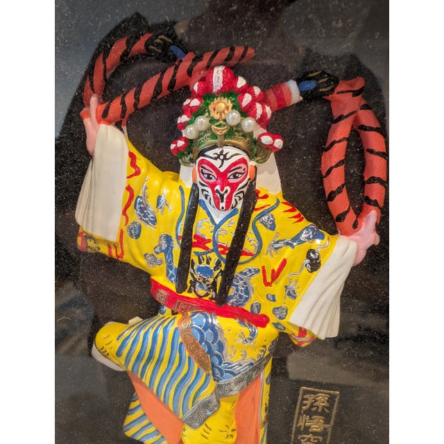 Add to your collection with this stunning clay figurine of the Monkey King, adorned with vibrant Beijing opera facial...