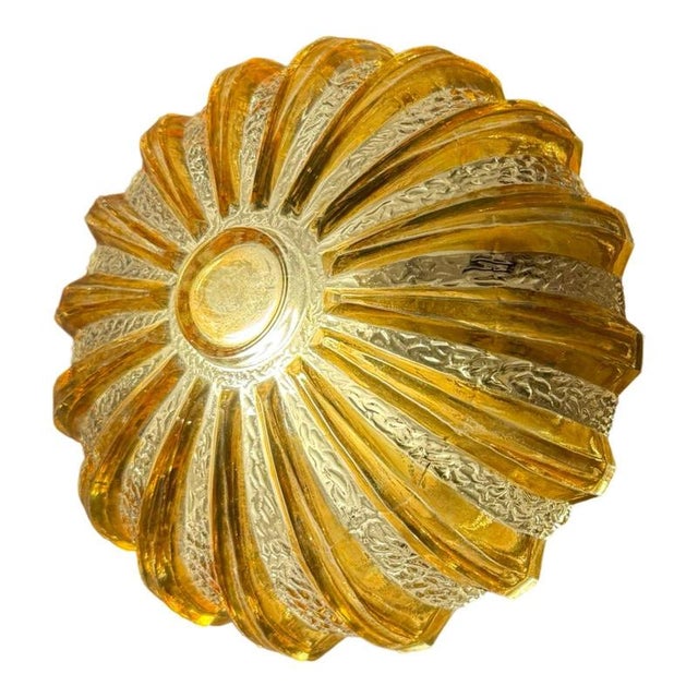 Vintage ceiling mounted lamp that can also be used as a wall lamp / wall sconce. Black exterior and pressed glass plated...