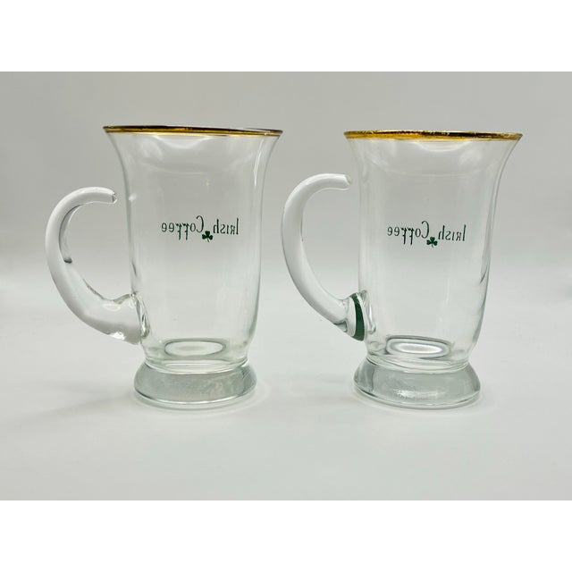 A charming pair of vintage clear glass Irish coffee mugs. Ships within 1-2 days using USPS. All items packed with care....