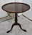 Vintage (1940's) Tilt Top Table has a Chipendale Style. The Wood is Mahogany. The table has a Flame Grain Top with a...