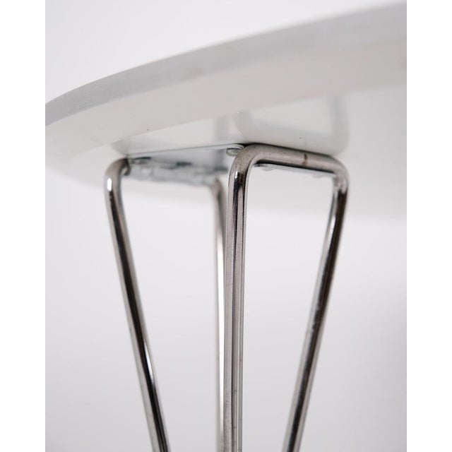 Superellipse coffee table designed by piet hein, bruno mathsson and arne jacobsen for fritz hansen. White laminate with...