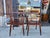 Two vintage solid cherry wood chairs with lots of charm and character. The chairs have some interesting details, and are...