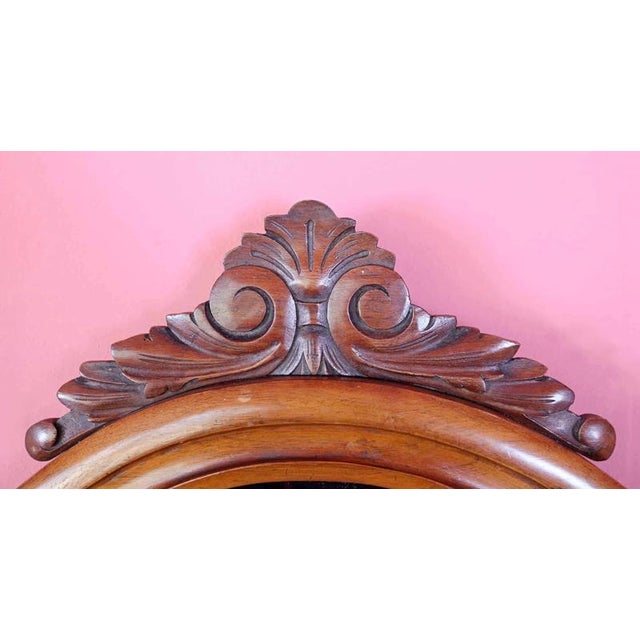 Solid mahogany mirror decorated with plant carving. Practical shelf (for storing keys, etc.) Condition: very good, free of...
