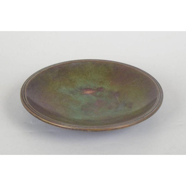 Just andersen, art deco bronze dish. Round dish in patinated bronze with softly curved forms and simple, rounded rims. The...