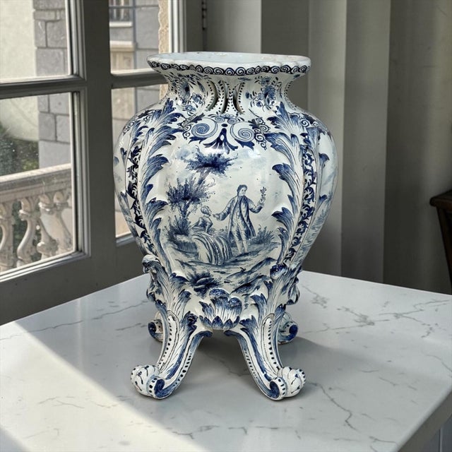 18th Century Hand-Painted Delft Jardinière, Signed LVD is a beautifully shaped vase, notable for its elegant, softly...