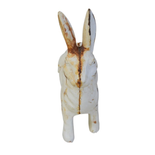 Vintage heavy cast iron standing rabbit statue, which traditionally served as a heavy doorstop or garden ornament. With...