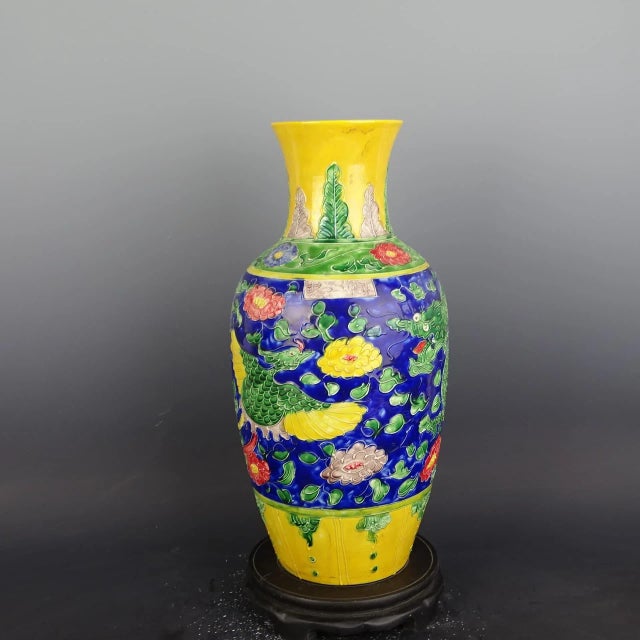W-22cm,H-43cm This product is a stunning Yellow Ground Famille Verte Porcelain Vase featuring intricate Dragon Phoenix...
