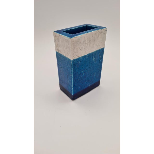 The Rimini Blue vase, designed by Aldo Londi for Bitossi in the 1960s, is an example of precise modernist geometry and a...