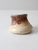 This handmade studio pottery piece features a rounded base and a sculpted rim with a subtle vertical notch, making it a...