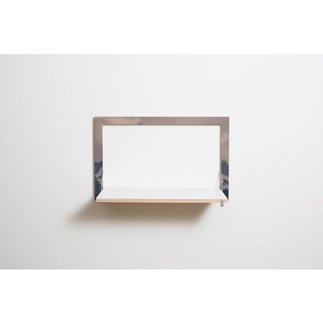 Wall art, workstation functional and discreet, this fläpps wall desk makes the perfect seated or standing workstation...