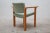 Vintage armchair by magnus olesen, denmark. Curved laminated oakwood design with light green upholstery. Dimensions: 55 w...