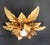 A very rare, large, decorative, and high-quality floral florentine ceiling or wall light set in a floral design, dating...