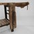 A vintage French wooden work table. Constructed from stout wooden beams, crafted with the owners livelihood in mind. This...