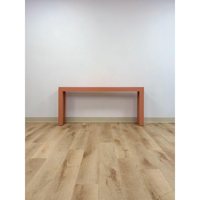 This fun and eye-catching vintage salmon laminate narrow console table is a bold and characterful retro accent find. The...