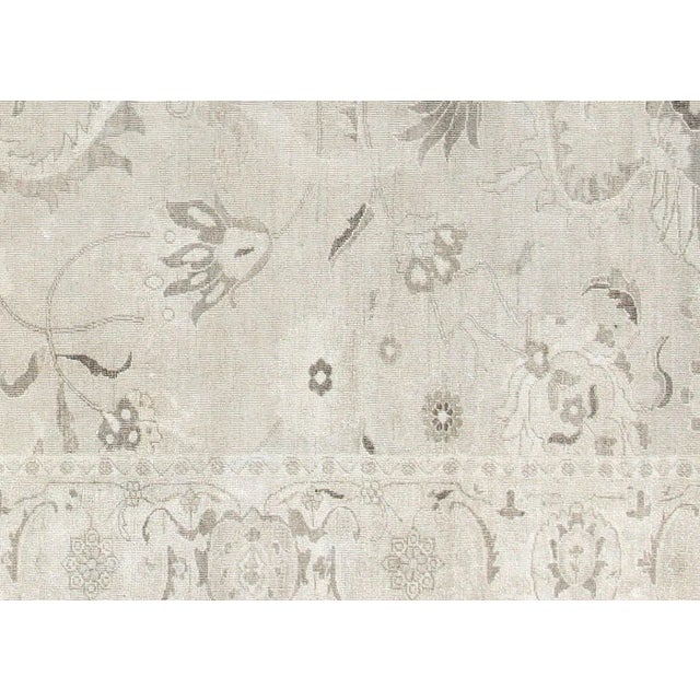 Crafted in the Nile delta region of Northern Egypt, this Vintage Egyptian Tabriz Rug boasts a traditional handwoven design...