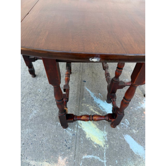 Vintage Jacobean Style Mahogany Gateleg Drop-Leaf Dining Table With Turned Stretcher Base For Sale - Image 11 of 12