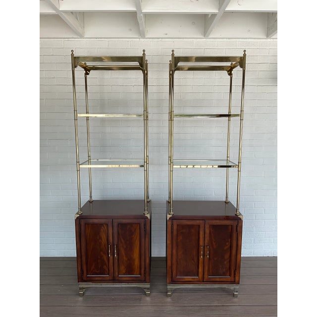 The sweetest pair of Etagere's you could possibly find. Vintage Thomasville Furniture. There are 3 glass shelves on each....