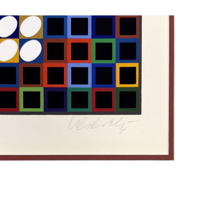 Serigraph in colors on paper. Hand signed lower right by Victor Vasarely. Hand numbered AP lower left (there is also a...