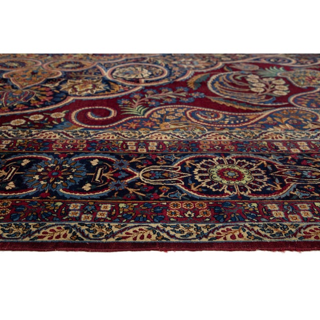 Textile Antique Kerman Persian Red Wool Rug With a Multicolored Floral Design For Sale - Image 7 of 11