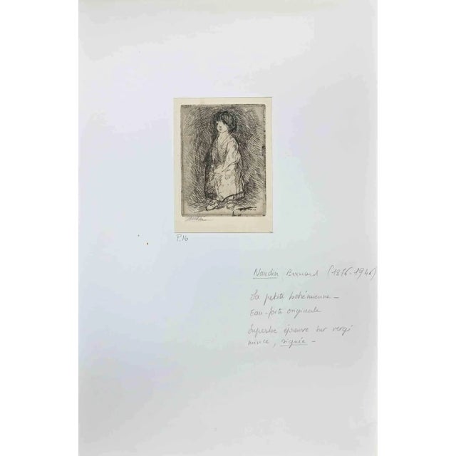 The Little Bohémienne is an Original Etching realized by Bernard Naudin (1876-1946). The artwork is in good condition on a...