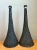 Defined by soaring conical silhouettes and dramatic tactile depth, this pair of vintage table lamps features an elongated...