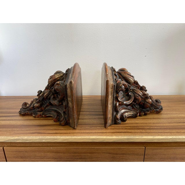 This could be used for a variety of purposes such as Book Ends, Corbels or wall shelving. Painted intricate wood design...