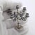 Elegant vintage figurine depicting a candelabra, handmade in Italy between the 1980s and 1990s in genuine Italian silver....