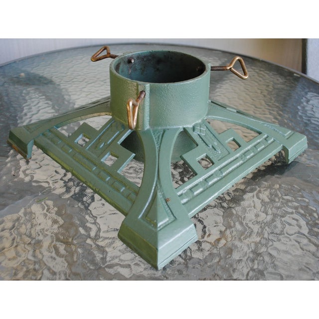 Arts and Crafts inspired cast iron Christmas Tree stand will hold a trunk up to 4.25" wide. This vintage stand has 4 metal...