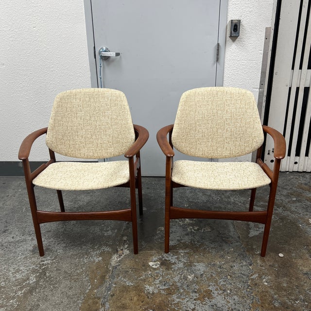 Design Plus Gallery presents a pair of the Circa 1960's Armchairs from Hovand-Olsen (1919–1989) for Jutex Furniture. These...