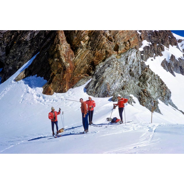 Mountainside Rest by Toni Frissell A group of skiers ponder their journey on the infamous “Haute Route", Switzerland,...