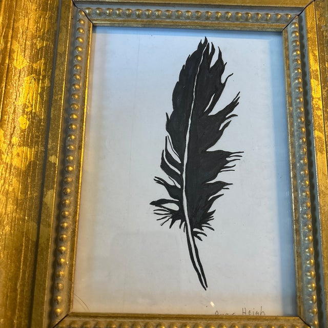 Contemporary black feather painting / drawing by Anna Heigh. Signed and framed. Measures 5x7 or approximately 9.5x11.5...