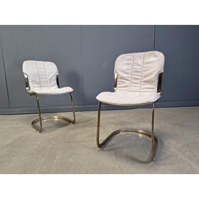 Italian Cantilever Dining Chairs from Cidue, 1970s, Set of 5, in Good conditions. Designed 1970 to 1979 This piece has an...