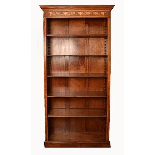 This is a beautiful vintage pair of open bookcases in the Sheraton style with adjustable shelves style dating from the...