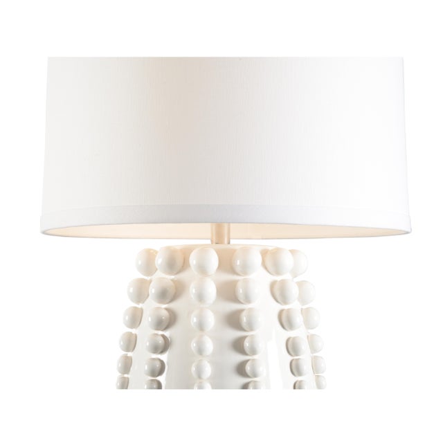 Create an eye-catching display with the Sea Urchin Lamp as the focal point. A white ceramic glaze finish, large silhouette...