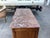 This is a true 18th century French Regency Commode. Made of warm French walnut, this piece features a serpentine front and...