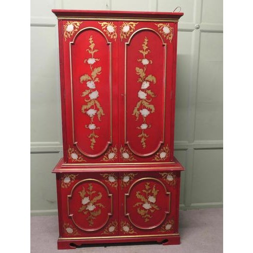 Tall Red Lacquer Cabinet with Interior Drawers and Shelves This Charming piece is finished in bright red with silver...