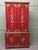 Tall Red Lacquer Cabinet with Interior Drawers and Shelves This Charming piece is finished in bright red with silver...