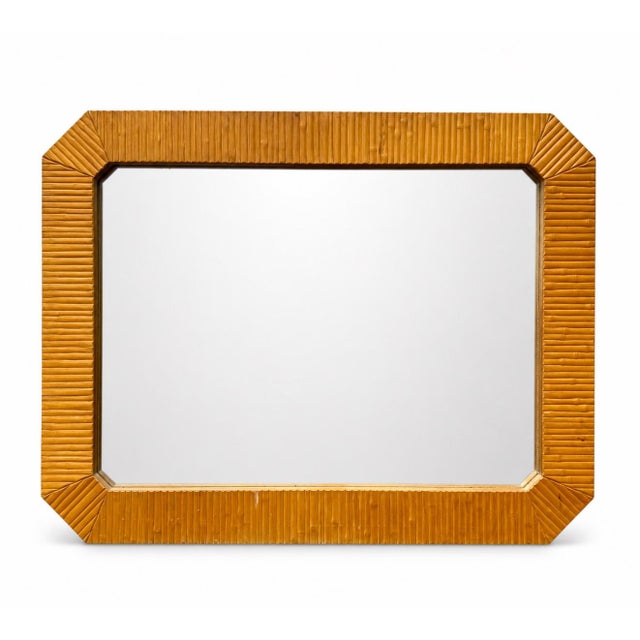 Amazing large coastal boho style wall mirror with a fully wrapped border of thick faux bamboo. Perfect addition to any...