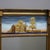 An antique wall mirror offers giltwood construction with reverse painted upper panel having countryside scene with church,...